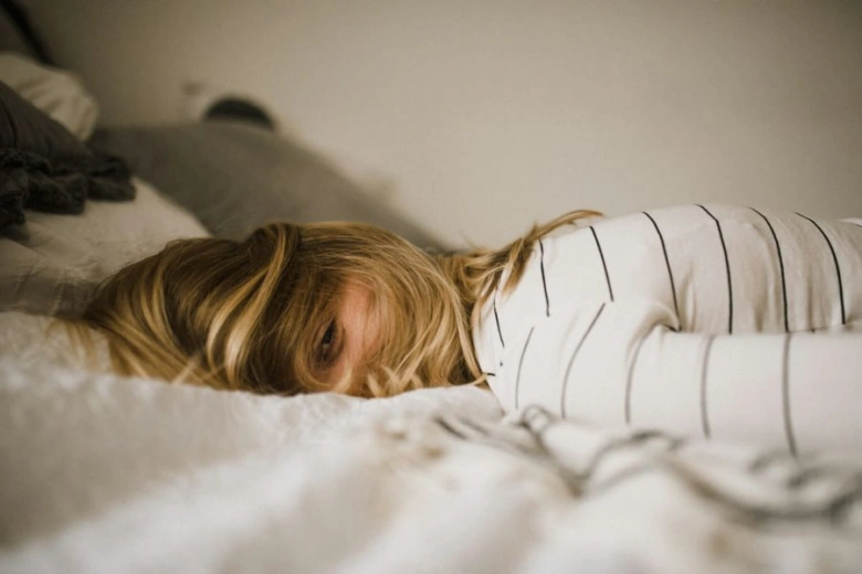 Person lying in bed
