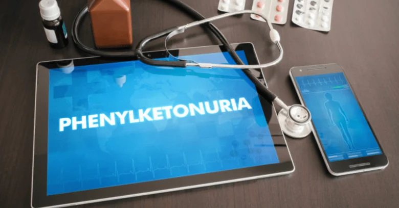 Tablet s textem fenylketonurie mezi lékařskými předměty