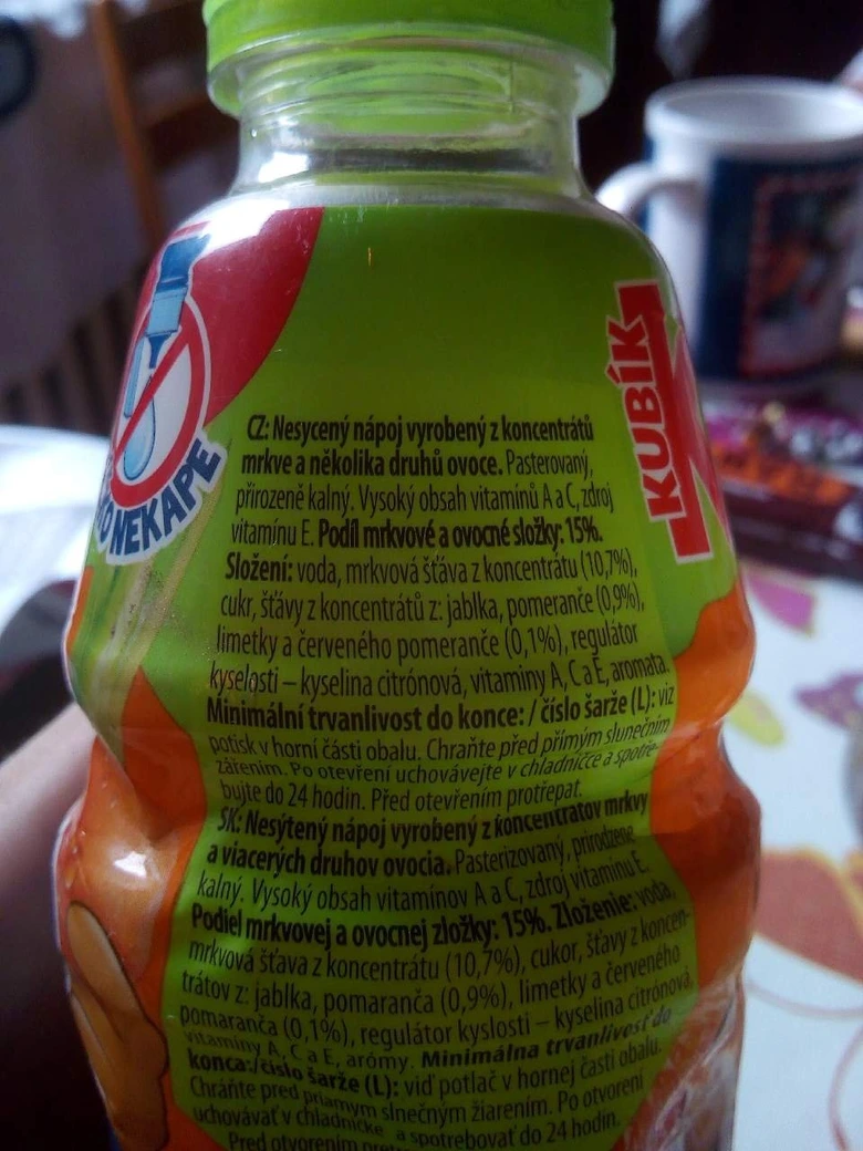 Zelená lahev s nápisem Kubík a složením v češtině.