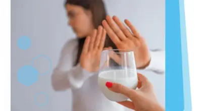 Woman refusing milk glass