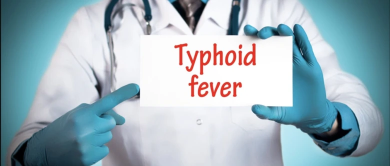 Doctor holding sign typhoid fever