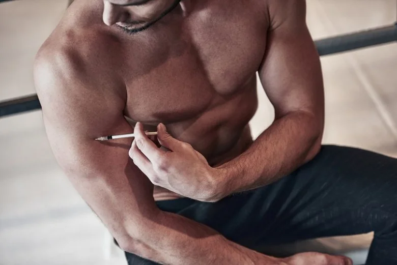Man injecting steroid