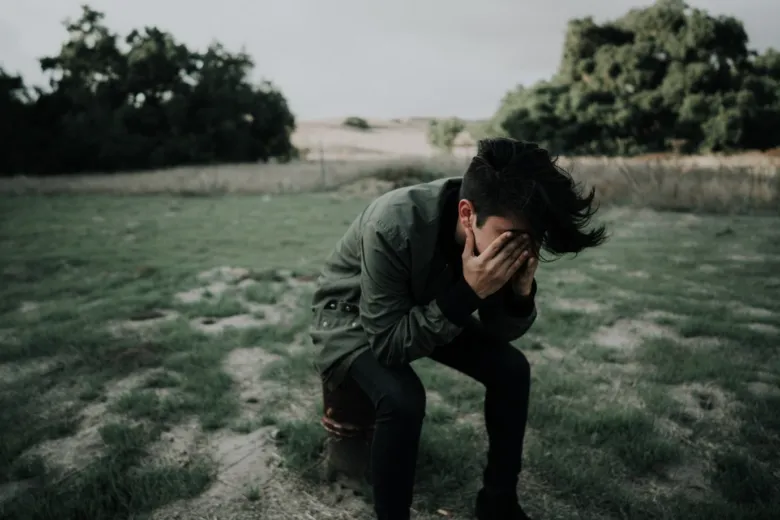 Man in distress outdoors